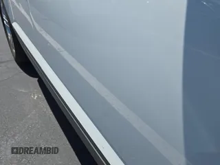 2023 Volkswagen Atlas SE z VIN 1V2HR2CA4PC526289, wystawiony jako IAAI lot #42734426 z przebiegiem 46 454 mil mil oraz . Historia ofert i sprzedaży dostępna na DreamBid. Obrazek 5.