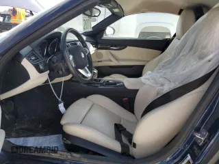 2011 BMW Z4 sDrive30i with VIN WBALM5C52BE378443, listed as a Copart auction lot 74115084 with 0 mi miles and Salvage Title. Bid and sale history available at carsss.com. Image 7.