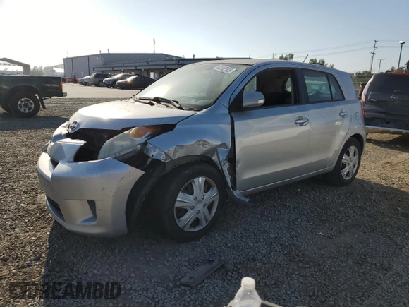 2009 Scion xD with VIN JTKKU10459J041424, listed as a Copart auction lot 62232525 with 223,790 mi miles and Salvage title. Bid and sale history available at DreamBid. Image 1.