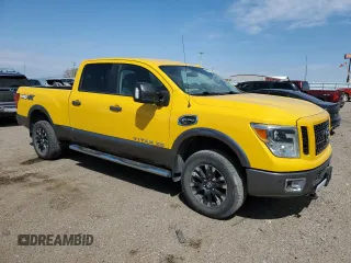2016 Nissan Titan SL with VIN 1N6BA1F41GN510955, listed as a Copart auction lot 54020155 with 135,551 mi miles and Clean title. Bid and sale history available at DreamBid. Image 4.