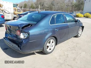 2009 Volkswagen Jetta SE with VIN 3VWRZ71K59M057372, listed as a IAAI auction lot 41741847 with 197,105 mi miles and . Bid and sale history available at DreamBid. Image 4.
