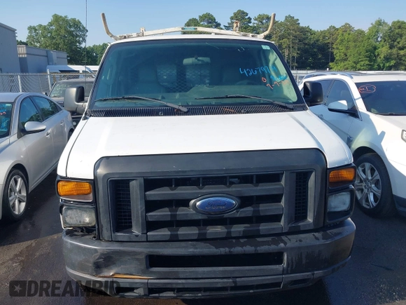 2014 Ford Econoline Cargo Commercial with VIN 1FTSE3EL9EDA49034, listed as a IAAI auction lot 42679719 with 217,659 mi miles and . Bid and sale history available at DreamBid. Image 12.