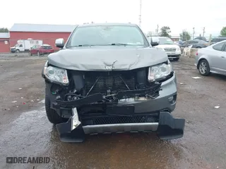 2012 Jeep Grand Cherokee Limited with VIN 1C4RJFBG0CC254425, listed as a IAAI auction lot 41962409 with 256,894 mi miles. Bid and sale history available at carsss.com. Image 6.