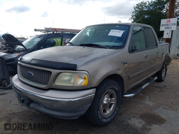 2003 Ford F-150 XLT with VIN 1FTRW07623KD34295, listed as a IAAI auction lot 41515387 with 163,506 mi miles. Bid and sale history available at carsss.com. Image 2.