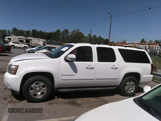 2014 Chevrolet Suburban LT with VIN 1GNSCJE05ER117663, listed as a IAAI auction lot 41992835 with 208,754 mi miles. Bid and sale history available at carsss.com. Image 14.
