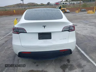 2020 Tesla Model Y Long Range with VIN 5YJYGDEE2LF022484, listed as a IAAI auction lot 41798662 with 108,978 mi miles and . Bid and sale history available at DreamBid. Image 16.