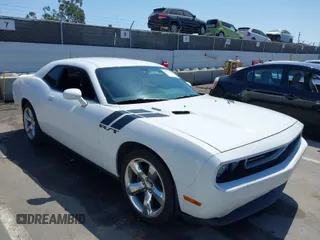 2014 Dodge Challenger R/T Plus z VIN 2C3CDYBT1EH176912, wystawiony jako IAAI lot #41992990 z przebiegiem 113 687 mil mil oraz . Historia ofert i sprzedaży dostępna na DreamBid. Obrazek 1.