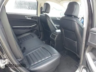 2024 Ford Edge SEL z VIN 2FMPK4J97RBA94298, wystawiony jako IAAI lot #42438544 z przebiegiem 39 589 mil mil oraz . Historia ofert i sprzedaży dostępna na DreamBid. Obrazek 8.