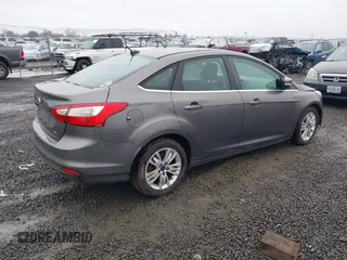 2012 Ford Focus SEL with VIN 1FAHP3H26CL239437, listed as a IAAI auction lot 41164604 with 169,946 mi miles. Bid and sale history available at carsss.com. Image 4.