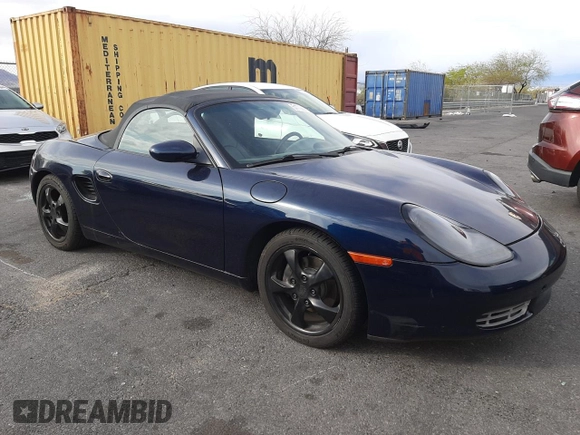 2000 Porsche Boxster z VIN WP0CA2981YU626756, wystawiony jako Copart lot #51706035 z przebiegiem 117 369 mil mil oraz Czysty tytuł • Clean title. Historia ofert i sprzedaży dostępna na DreamBid. Obrazek 4.