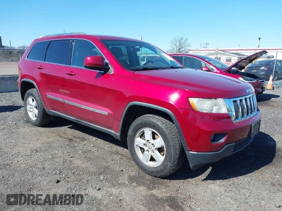 2012 Jeep Grand Cherokee Laredo with VIN 1C4RJFAG7CC297757, listed as a IAAI auction lot 41901645 with 270,731 mi miles. Bid and sale history available at carsss.com. Image 1.