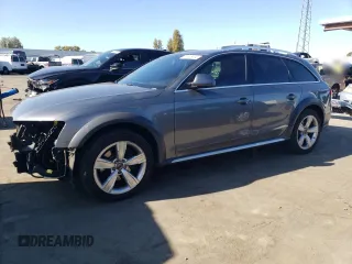 2014 Audi allroad Premium Plus with VIN WA1UFAFL5EA081709, listed as a Copart auction lot 79558464 with 87,890 mi miles and Salvage Title. Bid and sale history available at carsss.com. Image 2.