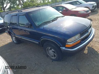 2000 Chevrolet Blazer LT z VIN 1GNDT13W2Y2145868, wystawiony jako IAAI lot #42445473 z przebiegiem 134 019 mil mil oraz . Historia ofert i sprzedaży dostępna na DreamBid. Obrazek 1.