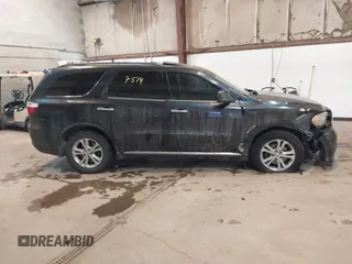 2013 Dodge Durango Crew z VIN 1C4RDJDG7DC661411, wystawiony jako IAAI lot #41617514 z przebiegiem 145 309 mil mil oraz . Historia ofert i sprzedaży dostępna na DreamBid. Obrazek 13.