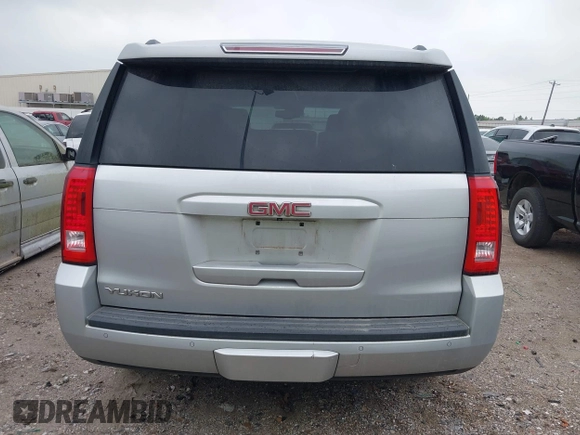 2015 GMC Yukon SLT z VIN 1GKS1BKC0FR172661, wystawiony jako IAAI lot #41911331 z przebiegiem 171 815 mil mil oraz . Historia ofert i sprzedaży dostępna na DreamBid. Obrazek 17.