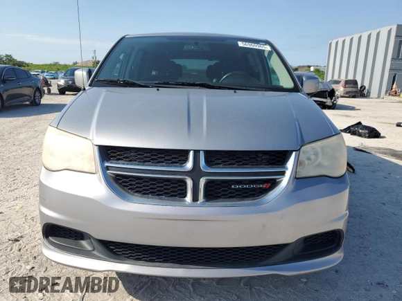 2014 Dodge Grand Caravan SXT z VIN 2C4RDGCG6ER223900, wystawiony jako Copart lot #56960965 z przebiegiem 101 275 mil mil oraz Szkoda całkowita • Salvage title. Historia ofert i sprzedaży dostępna na DreamBid. Obrazek 5.