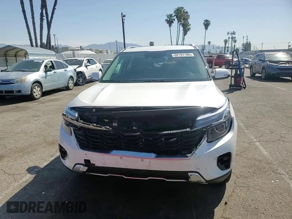 2024 Kia Seltos EX z VIN KNDER2AA9R7510656, wystawiony jako Copart lot #52191105 z przebiegiem 19 018 mil mil oraz Szkoda całkowita • Salvage title. Historia ofert i sprzedaży dostępna na DreamBid. Obrazek 12.