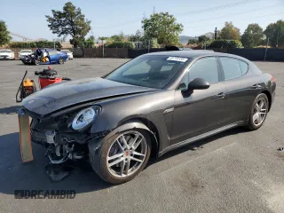 2014 Porsche Panamera with VIN WP0AA2A76EL006271, listed as a Copart auction lot 59770135 with 69,069 mi miles and Salvage title. Bid and sale history available at DreamBid. Image 1.