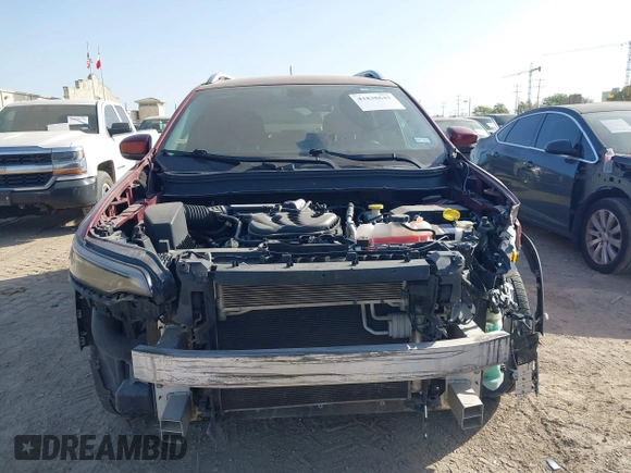 2019 Jeep Cherokee Altitude with VIN 1C4PJLLXXKD120325, listed as a IAAI auction lot 41838643 with 124,315 mi miles and . Bid and sale history available at DreamBid. Image 13.