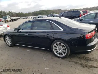 2015 Audi A8 L 4.0T with VIN WAU32AFD7FN004904, listed as a Copart auction lot 38942883 with 80,205 mi miles. Bid and sale history available at carsss.com. Image 2.