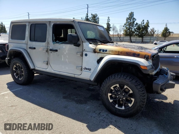2024 Jeep Wrangler Rubicon X с VIN 1C4RJXR62RW167216, выставлен на аукционе Copart как лот 49034325 с пробегом Не указан миль и Списание • Salvage title. История ставок и продаж доступна на DreamBid. Изображение 4.