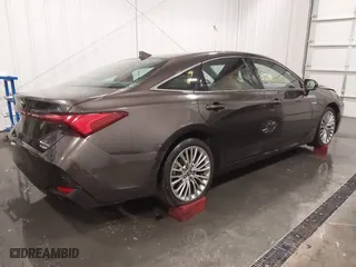 2019 Toyota Avalon Hybrid Limited with VIN 4T1B21FB3KU007114, listed as a IAAI auction lot 41658316 with 127,785 mi miles. Bid and sale history available at carsss.com. Image 4.