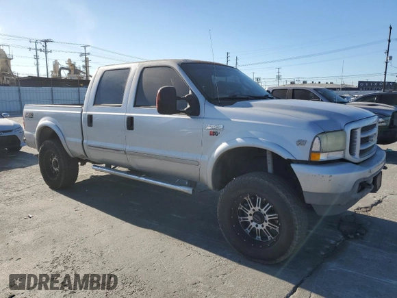 2003 Ford F-250 XL with VIN 1FTNW21S63EC36496, listed as a Copart auction lot 88551695 with 256,668 mi miles and Salvage title. Bid and sale history available at DreamBid. Image 4.