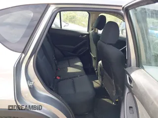 2014 Mazda CX-5 Sport with VIN JM3KE2BE9E0423737, listed as a IAAI auction lot 42222646 with 116,160 mi miles and . Bid and sale history available at DreamBid. Image 8.
