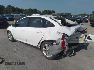 2013 Ford Focus SE with VIN 1FADP3F28DL215983, listed as a IAAI auction lot 42659890 with 117,912 mi miles and . Bid and sale history available at DreamBid. Image 3.