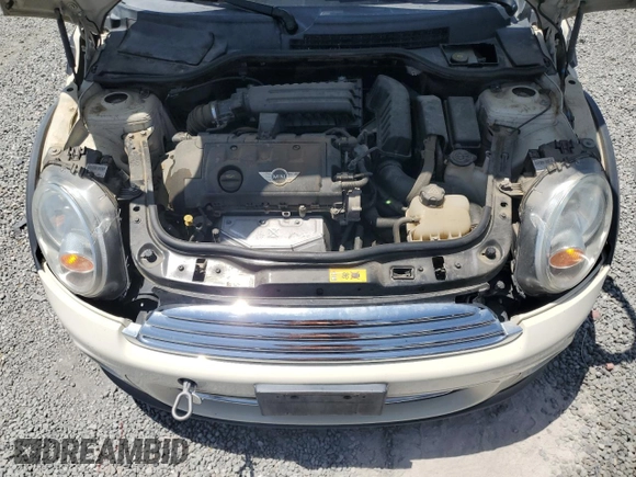 2013 MINI Hardtop z VIN WMWSU3C50DT685902, wystawiony jako Copart lot #58071935 z przebiegiem 114 908 mil mil oraz Szkoda całkowita • Salvage title. Historia ofert i sprzedaży dostępna na DreamBid. Obrazek 11.