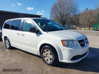 2012 Dodge Grand Caravan SE with VIN 2C4RDGBG1CR214990, listed as a IAAI auction lot 41737352 with 273,821 mi miles. Bid and sale history available at carsss.com. Image 1.