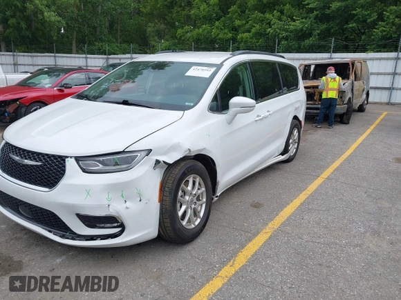 2022 Chrysler Pacifica Touring L with VIN 2C4RC1BG3NR149675, listed as a IAAI auction lot 42470593 with 59,956 mi miles and . Bid and sale history available at DreamBid. Image 6.