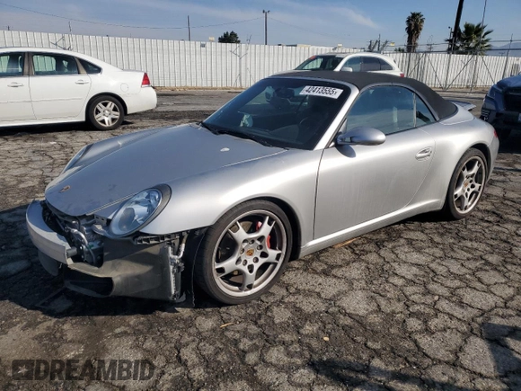 2005 Porsche 911 Carrera S z VIN WP0CB29995S765398, wystawiony jako Copart lot #42413555 z przebiegiem 32 993 mil mil oraz Szkoda całkowita • Salvage title. Historia ofert i sprzedaży dostępna na DreamBid. Obrazek 1.