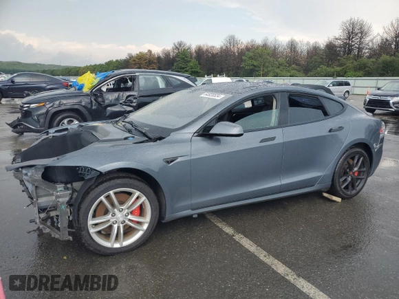 2014 Tesla Model S 60 with VIN 5YJSA1H14EFP28471, listed as a Copart auction lot 64928534 with 99,442 mi miles and Clean Title. Bid and sale history available at DreamBid. Image 1.