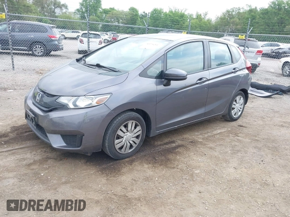 2015 Honda Fit LX with VIN 3HGGK5H58FM722880, listed as a IAAI auction lot 42276261 with 104,886 mi miles and . Bid and sale history available at DreamBid. Image 18.