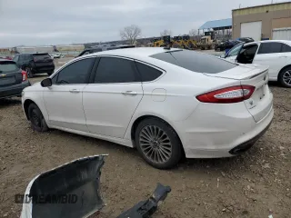 2016 Ford Fusion Titanium with VIN 3FA6P0K98GR369562, listed as a Copart auction lot 86547534 with 214,399 mi miles and Salvage Title. Bid and sale history available at carsss.com. Image 2.