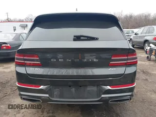 2021 Genesis GV80 with VIN KMUHBDSB4MU054934, listed as a IAAI auction lot 41543230 with 64,511 mi miles and . Bid and sale history available at DreamBid. Image 16.