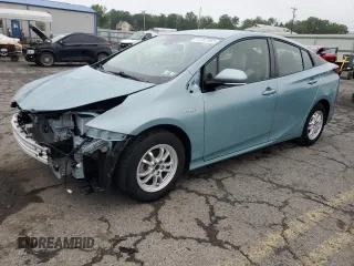 2019 Toyota Prius LE z VIN JTDL9RFU7K3001908, wystawiony jako Copart lot #61337855 z przebiegiem 25 301 mil mil oraz Szkoda całkowita • Salvage title. Historia ofert i sprzedaży dostępna na DreamBid. Obrazek 1.