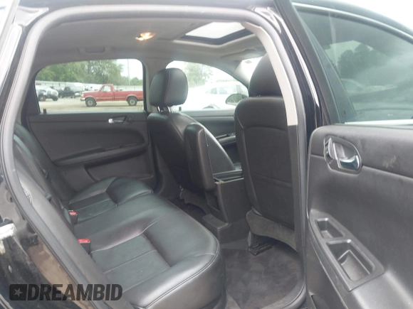 2014 Chevrolet Impala LTZ with VIN 2G1WC5E36E1138809, listed as a IAAI auction lot 41961255 with 119,222 mi miles and . Bid and sale history available at DreamBid. Image 8.