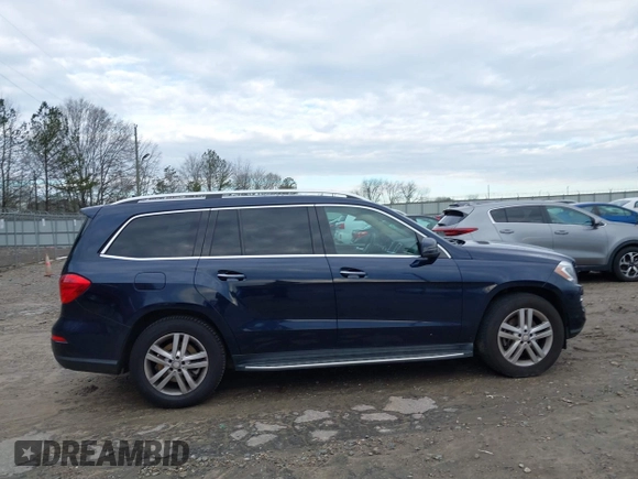 2015 Mercedes-Benz GL-Class GL 450 with VIN 4JGDF6EE9FA513009, listed as a IAAI auction lot 41311164 with 121,185 mi miles. Bid and sale history available at carsss.com. Image 13.