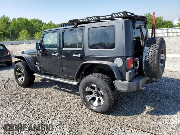 2008 Jeep Wrangler Unlimited X z VIN 1J4GA39128L518897, wystawiony jako Copart lot #52297525 z przebiegiem 163 676 mil mil oraz Nie do naprawy • Non repairable. Historia ofert i sprzedaży dostępna na DreamBid. Obrazek 2.