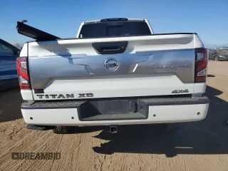 2021 Nissan Titan XD SV with VIN 1N6AA1FB0MN517885, listed as a Copart auction lot 77046004 with 52,284 mi miles and Salvage Title. Bid and sale history available at carsss.com. Image 6.