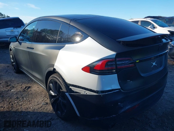 2020 Tesla Model X Long Range with VIN 5YJXCDE28LF298553, listed as a IAAI auction lot 40863184 with 54,031 mi miles and . Bid and sale history available at DreamBid. Image 3.