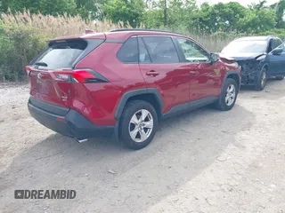 2019 Toyota RAV4 XLE with VIN JTMP1RFV2KD021348, listed as a IAAI auction lot 42198925 with 130,838 mi miles and . Bid and sale history available at DreamBid. Image 4.