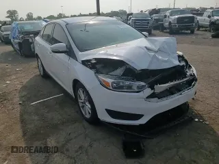2016 Ford Focus SE with VIN 1FADP3F23GL404271, listed as a Copart auction lot 59134625 with 115,730 mi miles and Clean title. Bid and sale history available at DreamBid. Image 13.