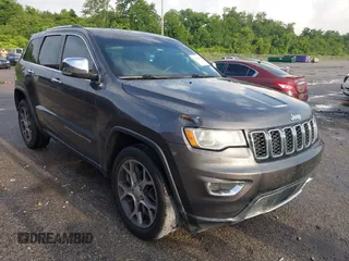 2019 Jeep Grand Cherokee Limited z VIN 1C4RJEBGXKC698940, wystawiony jako IAAI lot #42450938 z przebiegiem 148 930 mil mil oraz . Historia ofert i sprzedaży dostępna na DreamBid. Obrazek 1.