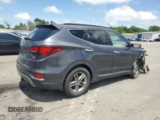 2017 Hyundai Santa Fe 2.4L z VIN 5XYZUDLB8HG430221, wystawiony jako Copart lot #64330015 z przebiegiem 151 318 mil mil oraz Szkoda całkowita • Salvage title. Historia ofert i sprzedaży dostępna na DreamBid. Obrazek 3.