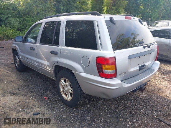 2002 Jeep Grand Cherokee Laredo z VIN 1J4GW48S62C261154, wystawiony jako IAAI lot #42602424 z przebiegiem 160 295 mil mil oraz . Historia ofert i sprzedaży dostępna na DreamBid. Obrazek 3.