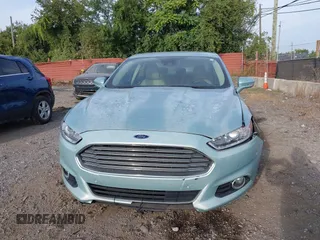 2014 Ford Fusion SE Hybrid with VIN 3FA6P0LU2ER168949, listed as a IAAI auction lot 40366468 with 188,802 mi miles. Bid and sale history available at carsss.com. Image 12.