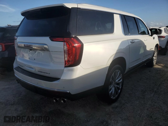 2022 GMC Yukon XL Denali with VIN 1GKS1JKL4NR132740, listed as a Copart auction lot 74690404 with 30,914 mi miles and Non Repairable. Bid and sale history available at DreamBid. Image 3.